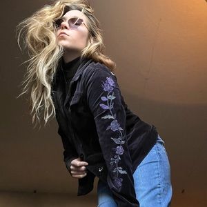 Black jacket with embroidery on arms